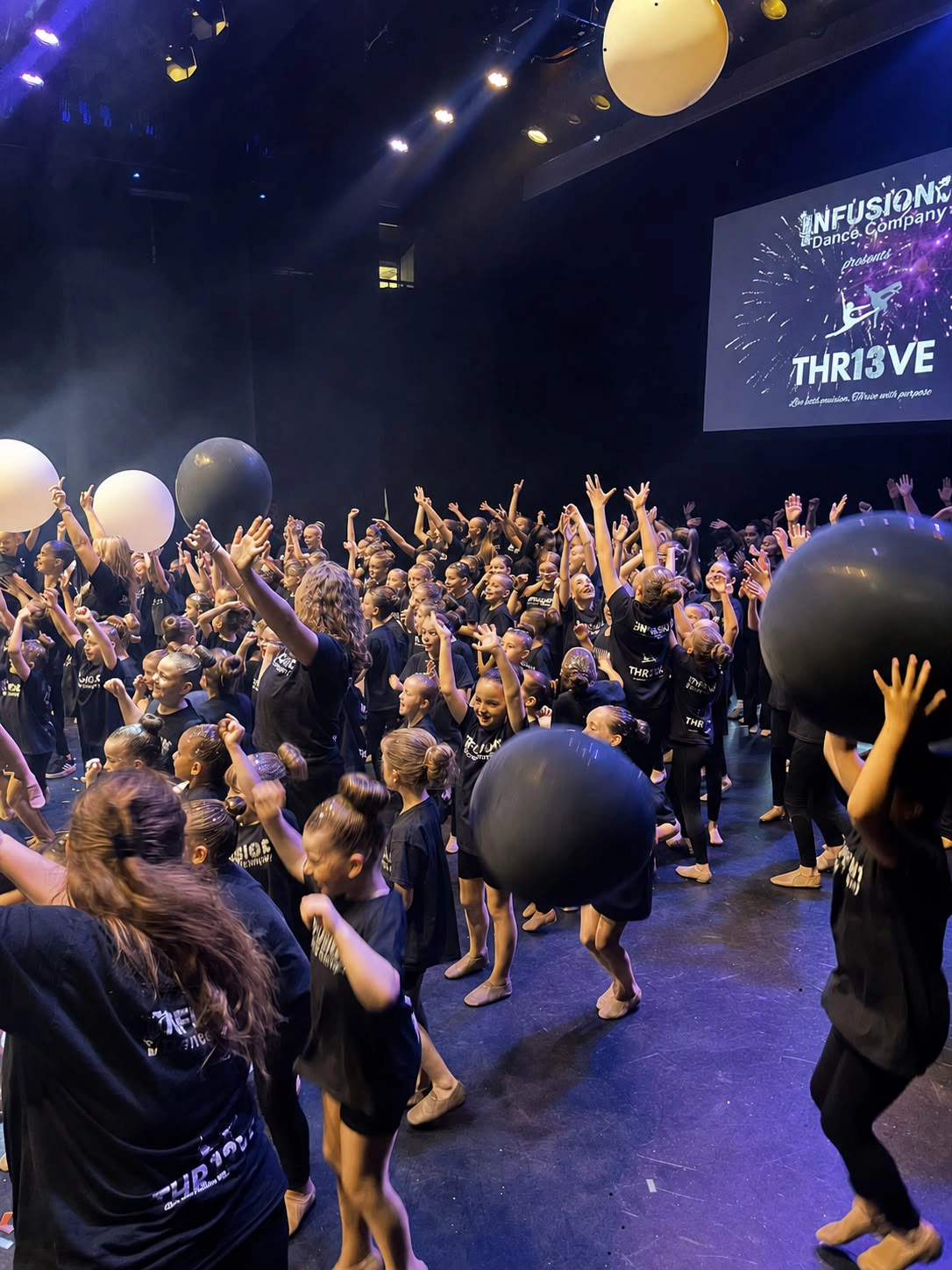 Infusion Dance Company students on stage at THR13VE showcase